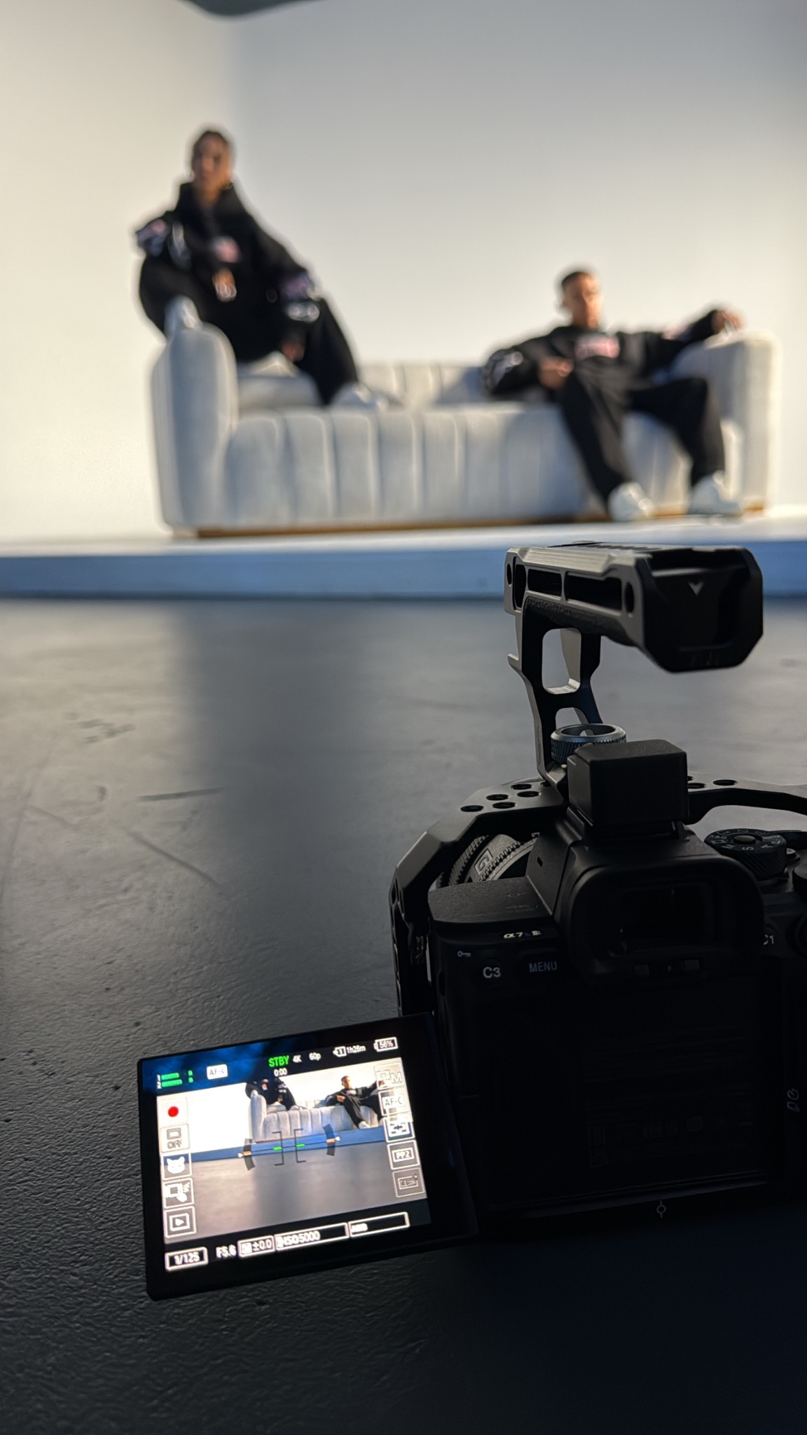 Videographer filming an editorial model